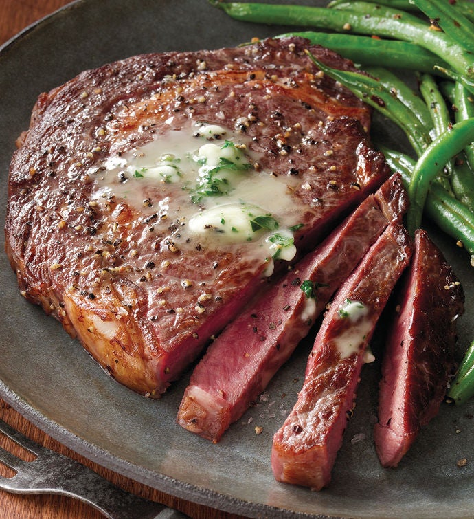 Boneless Rib Eye Steak with one Free Side Dish